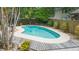Inviting backyard pool with a sun deck, perfect for relaxation and entertaining at 3714 Village Estates Pl, Tampa, FL 33618