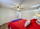 Bedroom with closet and ceiling fan features modern decor and lots of light at 3932 Watson Dr, New Port Richey, FL 34655