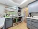 Updated kitchen with modern appliances and a large window overlooking the backyard at 3932 Watson Dr, New Port Richey, FL 34655