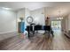 Bright living room with hardwood floors offers a cozy and inviting atmosphere at 3932 Watson Dr, New Port Richey, FL 34655