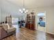 Spacious living room with hardwood floors offers a bright and airy atmosphere at 3932 Watson Dr, New Port Richey, FL 34655