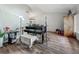 Spacious living room features hardwood floors and ample natural light at 3932 Watson Dr, New Port Richey, FL 34655