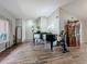 Bright living room with hardwood floors provides comfort and style at 3932 Watson Dr, New Port Richey, FL 34655