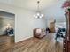 Bright living room with hardwood floors offers a cozy space at 3932 Watson Dr, New Port Richey, FL 34655