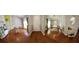 Open dining area featuring hardwood floors, lots of natural light, and stylish decor elements at 404 Oakmount Rd, Clearwater, FL 33765