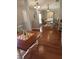 Inviting dining room with wood floors, stylish furnishings, and ample natural light at 404 Oakmount Rd, Clearwater, FL 33765