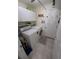 Practical laundry room featuring a washer, dryer, and ample storage space at 404 Oakmount Rd, Clearwater, FL 33765