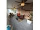Bright sunroom with lots of windows, comfortable furniture, and tile flooring at 404 Oakmount Rd, Clearwater, FL 33765