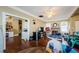 Open living area with hardwood floors that leads to the kitchen and the laundry room at 41 W Boyer St, Tarpon Springs, FL 34689