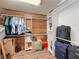 Walk-in closet with wood paneling and shelving at 44 Pinewood Cir, Safety Harbor, FL 34695