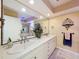 Bright main bathroom with double sinks and counter space at 44 Pinewood Cir, Safety Harbor, FL 34695