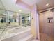 Main bathroom with tub, shower, and vanity at 44 Pinewood Cir, Safety Harbor, FL 34695