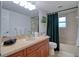 Bathroom with vanity, sink, mirror, shower and toilet at 506 Summerwood Ct, Tarpon Springs, FL 34689