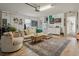 Converted garage space used as living room space with a modern sofa and contemporary decor at 5351 Bridge St # 9, Tampa, FL 33611