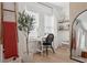 Well-lit office space featuring a modern desk, ladder, and stylish decor at 5351 Bridge St # 9, Tampa, FL 33611