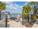 Outdoor patio area with fire pit, chairs and waterfront views at 5351 Bridge St # 9, Tampa, FL 33611