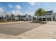 Street view of commercial buildings and palm tree landscaping at 5351 Bridge St # 9, Tampa, FL 33611