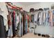 Spacious walk-in closet with ample storage, shelving, and hanging space at 5351 Bridge St # 9, Tampa, FL 33611