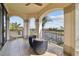 Balcony featuring comfortable seating and stunning views of the waterfront at 5405 Tybee Island Dr, Apollo Beach, FL 33572
