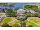 Stunning aerial view of the community center, showcasing beautifully landscaped grounds and lake access at 5405 Tybee Island Dr, Apollo Beach, FL 33572