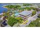 Aerial view of community pool featuring a lighthouse, water slide and splash pad with lake views at 5405 Tybee Island Dr, Apollo Beach, FL 33572