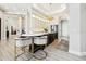 Modern kitchen featuring a large island, pendant lighting, and sleek countertops at 5405 Tybee Island Dr, Apollo Beach, FL 33572