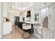 Modern kitchen with an island, stainless steel appliances, and custom cabinetry at 5405 Tybee Island Dr, Apollo Beach, FL 33572