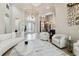 Well-lit living room with tile flooring, stylish furniture, decorative accents, and views into the adjacent dining area at 5405 Tybee Island Dr, Apollo Beach, FL 33572