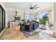 Inviting outdoor space with a built-in grill, dining area, and view of the waterway at 5405 Tybee Island Dr, Apollo Beach, FL 33572