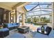 Expansive outdoor living area with pool, spa, fire pit, and comfortable seating for ultimate relaxation at 5405 Tybee Island Dr, Apollo Beach, FL 33572