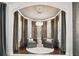 Cozy sitting area features two chairs, a round rug, and a chandelier at 5405 Tybee Island Dr, Apollo Beach, FL 33572