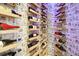 Custom wine cellar featuring brick walls and wooden racks filled with wine bottles at 5405 Tybee Island Dr, Apollo Beach, FL 33572