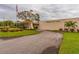 Beautifully landscaped clubhouse with manicured lawns and lush greenery at 5521 80Th N St # 110, St Petersburg, FL 33709