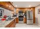 Well-appointed kitchen featuring stainless steel appliances, and ample countertop space at 602 Lynchburg Dr, Brandon, FL 33511
