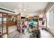Rear enclosed porch providing storage and a view into the open kitchen at 602 Lynchburg Dr, Brandon, FL 33511