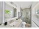 Nicely updated bathroom featuring a glass shower with a marble surround at 607 Carolyn Dr, Brandon, FL 33510