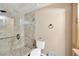 Bathroom featuring a glass shower with a tile surround at 607 Carolyn Dr, Brandon, FL 33510