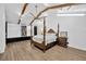 Spacious bedroom with vaulted ceiling, hardwood floors, and a king-sized bed at 607 Carolyn Dr, Brandon, FL 33510