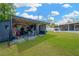 Organized shed filled with tools and equipment, surrounded by a well-maintained lawn at 607 Carolyn Dr, Brandon, FL 33510