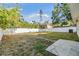 Expansive backyard featuring a full privacy fence and plentiful green space at 7012 S Trask St, Tampa, FL 33616