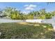 Spacious backyard with a privacy fence providing ample space for recreation and relaxation at 7012 S Trask St, Tampa, FL 33616