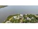 Aerial view of the property with waterfront access and canal at 7404 Bay Dr, Tampa, FL 33635