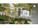 Aerial view of the property featuring the canal and waterfront access at 7404 Bay Dr, Tampa, FL 33635