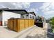 Back exterior view of home, shows hot tub and deck at 7404 Bay Dr, Tampa, FL 33635