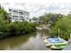 The beautiful water view shows the canal and nearby homes at 7404 Bay Dr, Tampa, FL 33635