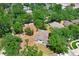 Aerial view showcasing home nestled amongst lush trees, close to neighbors at 808 Hickory Glen Dr, Seffner, FL 33584