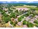 Aerial view of neighborhood showcasing the home's location amongst trees at 808 Hickory Glen Dr, Seffner, FL 33584