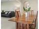 Open dining area with wooden table and chairs adjacent to a living area at 808 Hickory Glen Dr, Seffner, FL 33584