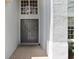 Close up of front doors featuring brick pavers, well maintained landscaping, and new wreaths at 808 Hickory Glen Dr, Seffner, FL 33584