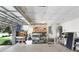 Organized two-car garage featuring shelving, storage and various items at 808 Hickory Glen Dr, Seffner, FL 33584